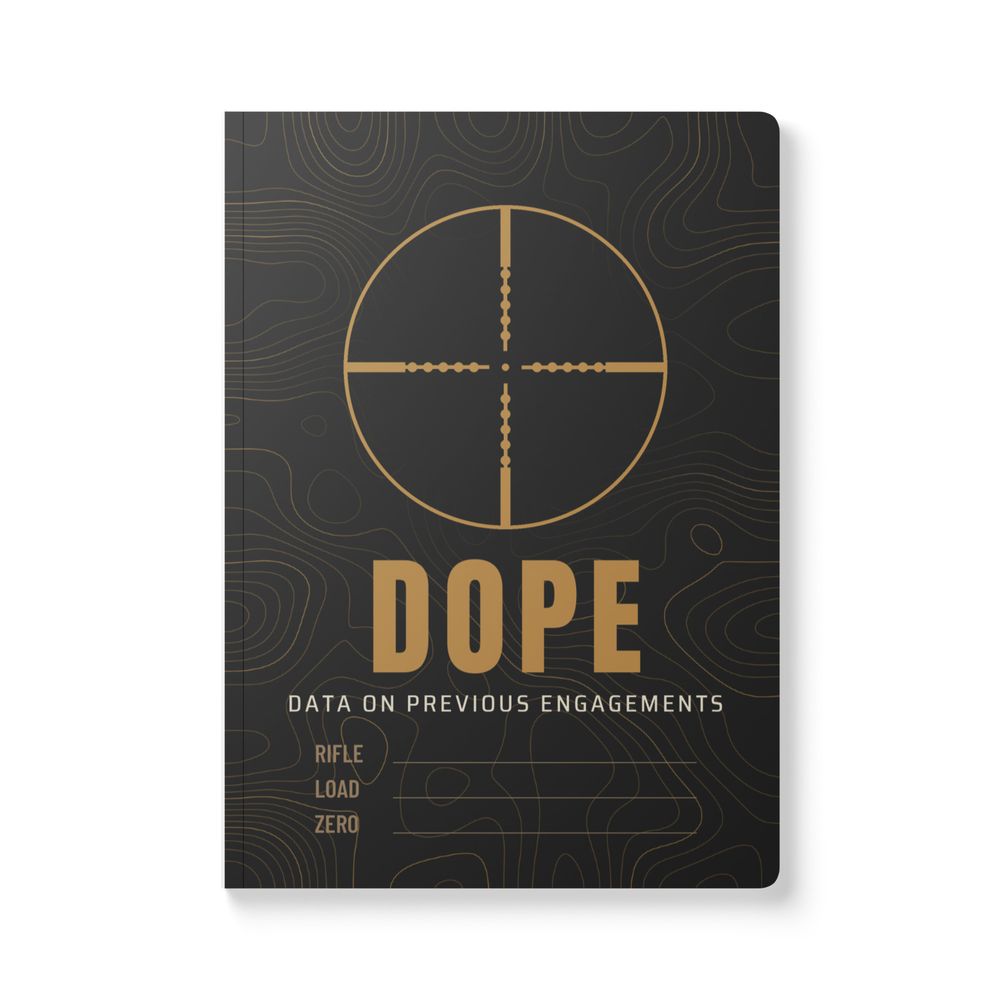 Reticle DOPE Book: black softcover with a gold reticle over topo, DOPE, DATA ON PREVIOUS ENGAGEMENTS and RIFLE, LOAD, ZERO write-in lines