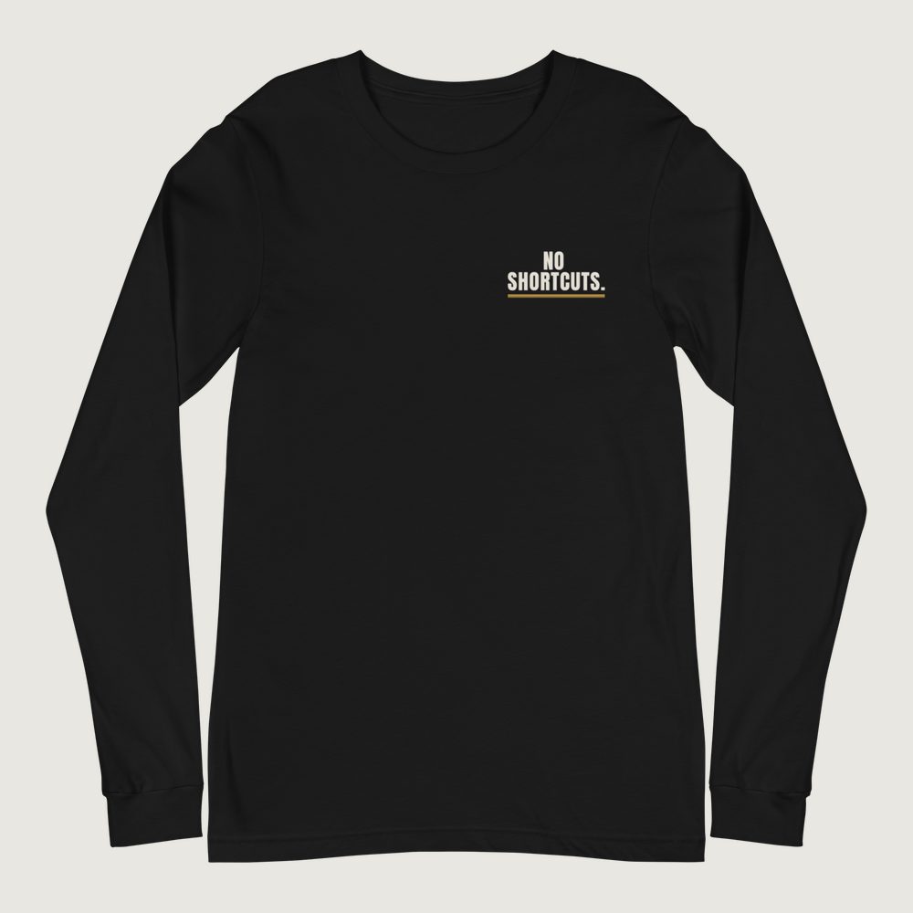 Warhorn Classic Long Sleeve in Black, front: “No Shortcuts.” lettering over a gold rule, left chest